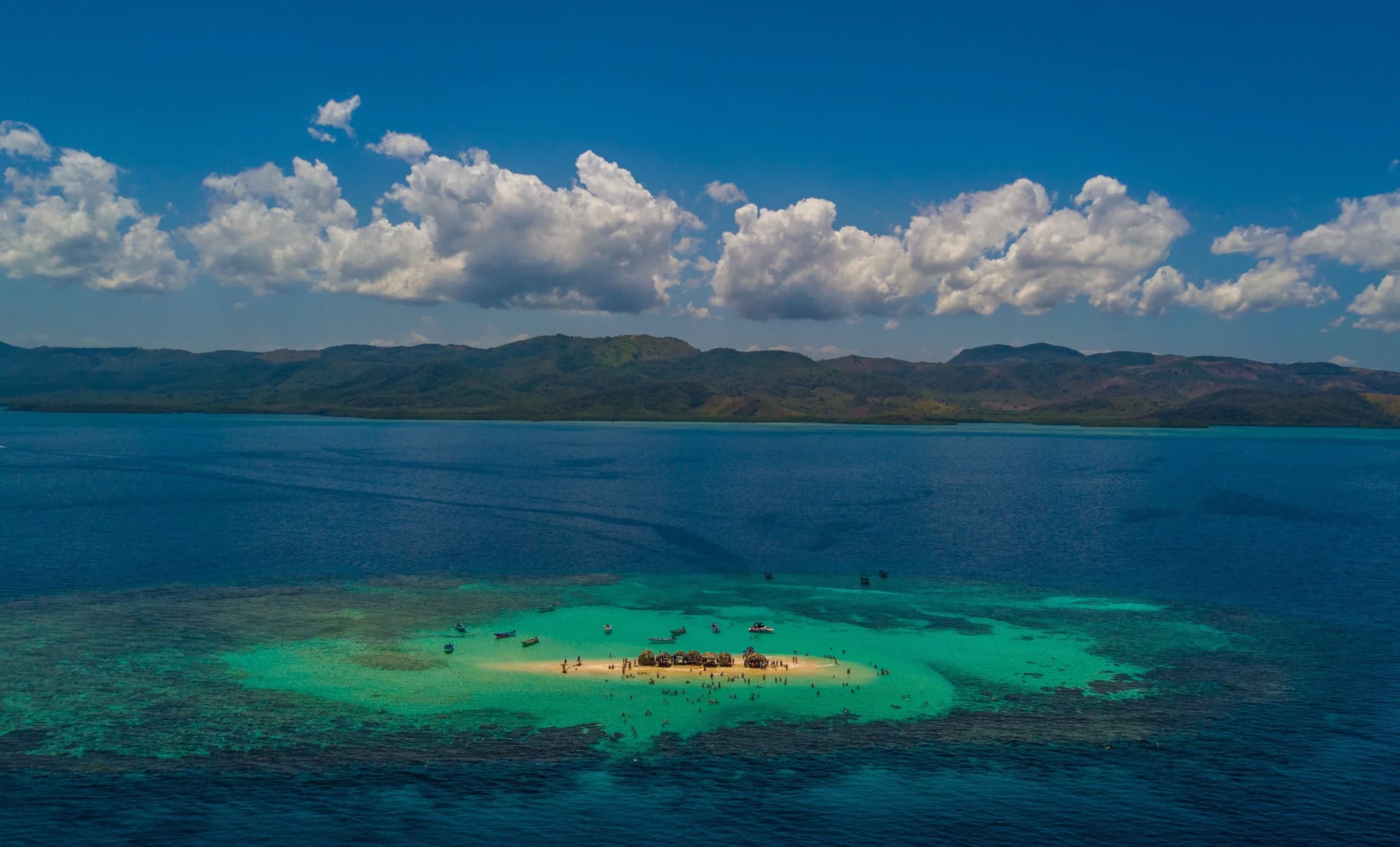 Aerial drone view of Cayo Arena, Paradise Island, surrounded by turquoise waters in Monte Cristi, Dominican Republic
